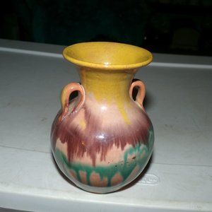 vintage clay pottery vase.